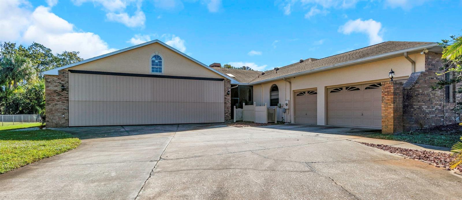 Estate with private hangar in gated airpark community in New Port Richey, FL