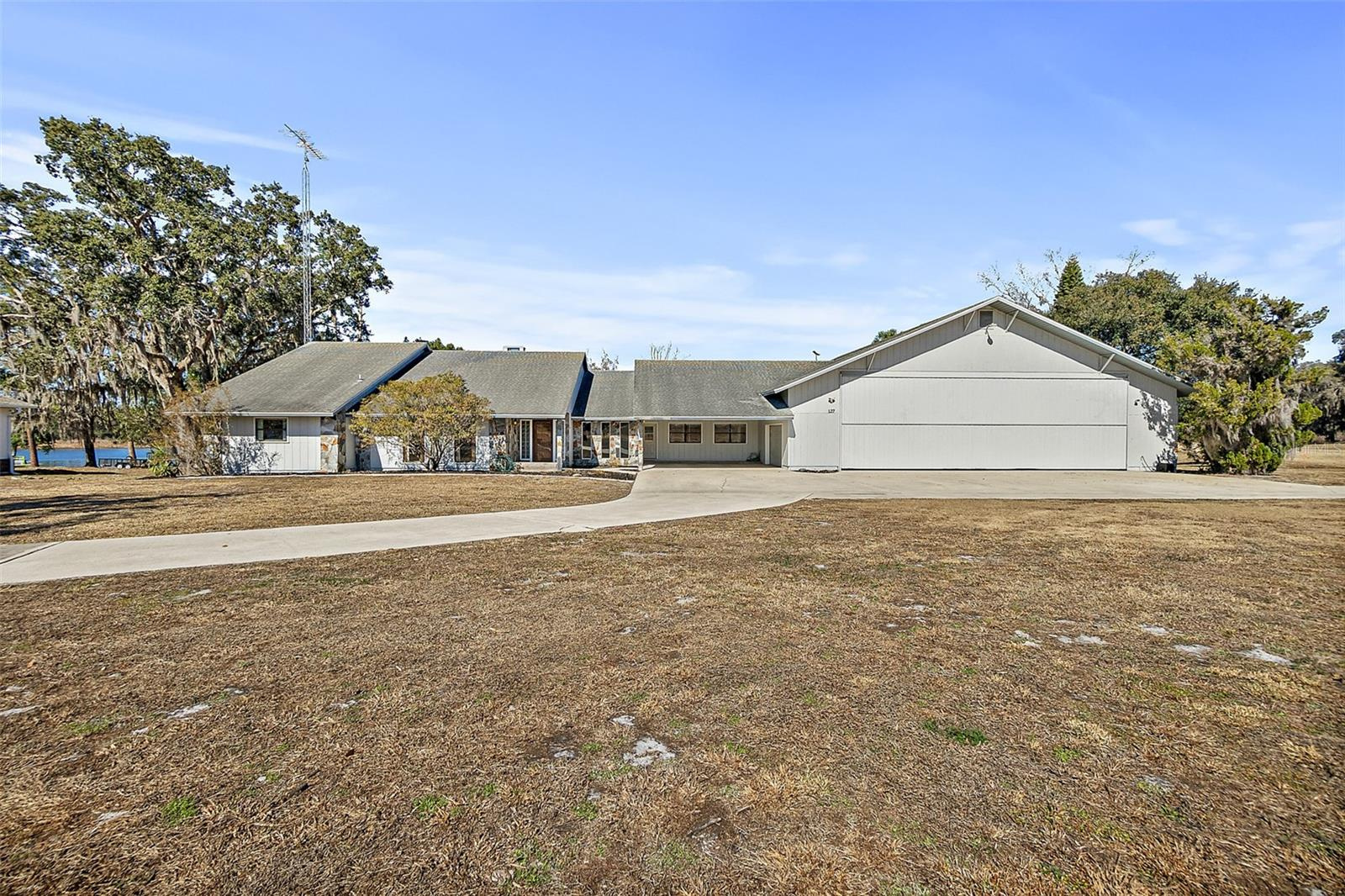 Lakefront Home with Private Hangar at Eagles Nest Aerodrome & Seaplane Base