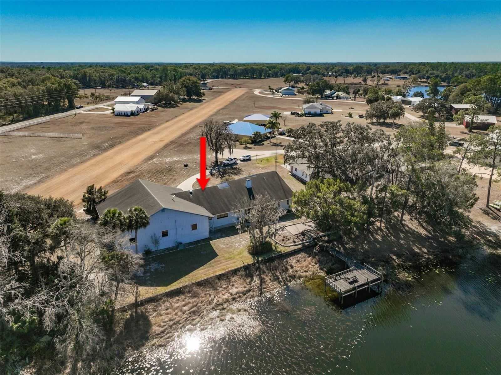 Lakefront Home with Private Hangar at Eagles Nest Aerodrome & Seaplane Base $695,000